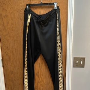 Nike black and gold sweat pants